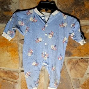 At home, vintage snowman baby onesie